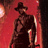 Static pixelated icon of a figure in dark clothing and hat against red background with light streaks, low-resolution rendering.