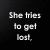 Black background with white pixelated text reading "She tries to get lost." on the left and "Just so she can be found <333" on the right.