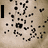 Animated sequence showing text forming from scattered black pixels on a beige background, with 'I', 'Love', and 'You' appearing sequentially.