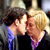 Pixelated static image of two people kissing with visible facial features and clothing details in a 50x50 icon format.