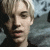 Four- shows a person with light hair in three top and text/logo in bottom-right