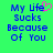 Green background with blue pixelated text reading 'My Life Sucks Because Of You' and a pink heart symbol replacing the letter 'i' in 'Life'.