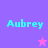 Pixelated text 'Aubrey' in cyan on purple and pink backgrounds with a star symbol changing color between frames.