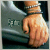 six showing a person's hand with bracelets and dark nail polish, with text overlays reading "Spice isn't the only Hottie to wear black nail polish"