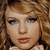 Pixelated image of a person with light brown curly hair and blue eyes, wearing red lipstick, with overlaid text phrases.