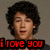 Pixelated image of a person with dark curly hair and a neutral expression, with red text reading 'i love you' at the bottom.