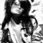 Black-and-white pixelated image divided into four quadrants with text and a partial figure.