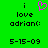 Green background displays black text 'i love adrian: 5-15-09' with a pink pixelated heart symbol above the word 'love'.