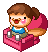 Pixel art character with brown pigtails sits on pink chair, wearing blue shirt and gray pants; mouth opens/closes in animation sequence.