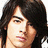 A four- shows a person with long dark hair in different poses, with partial orange text at the bottom