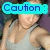 Pixelated image of a person in a gray tank top with cyan and pink text overlays reading "Caution:" and "Dangerous".
