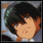 Pixelated anime-style character with dark hair and green leaf-like accessory, next to text reading 'Anime IM' and 'com' on black background.