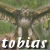 Pixelated image of a humanoid figure with large eyes and antennae-like appendages, standing against a blurred greenish background with white text at the bottom.