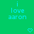 Green background with cyan pixelated text 'i love aaron' and two heart symbols, one on each side.