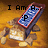 A pixelated image of a chocolate bar with scattered pieces on a brown background, showing text changes across frames.