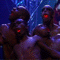 A repeated of identical figures with dark skin, red glowing eyes, and muscular torsos in a blue-lit environment
