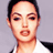 Pixelated close-up of a person's face with short dark hair, light skin tone, and visible facial features against a plain gray background.