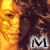 repeated pixelated faces with a warm orange-brown color palette, overlaid by sequentially changing letters forming 'M A R I A H' across two