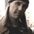 A 3x3 contact sheet of a static animated icon featuring four distinct human faces and promotional text for Hootie & the Blowfish's new album, displayed on a gray background with visible pixelation and dithering effects.