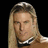 Pixelated image of a person with long blonde hair and a choker necklace, alongside text reading "American Classic" and "Kevin Carroll."