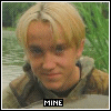 nine identical pixelated images showing a person with blonde hair in a brown jacket against green foliage and water, each labeled 'MINE' below