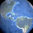 Pixelated globe image with green text on cyan background reading 'A friend is someone who walks in when the rest of the world walks out'
