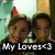Two people wearing red pointed hats pose together in a pixelated image with text overlay.