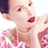 Static 48x48 pixel icon showing a close-up of a person's face with pink floral patterns on clothing, visible red lips, and partial dark hair against white background.