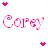Pixelated icon with pink and white checkered background, two red heart symbols at top-left and bottom-right corners, and stylized text reading 'Corey' in gradient pink tones.
