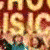 Animated icon displays 'HIGH SCHOOL MUSICAL' text over a group of people in colorful outfits, with visible pixelation and motion effects.
