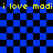 Blue and black checkered background with yellow text repeating 'i love madi' at top and bottom, two pixelated circular patterns on right side.