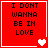 Red square with black text "I DONT WANNA BE IN LOVE" and white heart symbols in four quadrants.