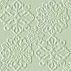 A static pattern of four interconnected floral or lace-like motifs on a pale green background, each with symmetrical petal and scroll details.