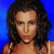 Pixelated image of a person with long dark hair against a solid blue background, wearing a light brown sleeveless top.