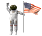 Astronaut in white spacesuit with dark helmet waves beside American flag on pole, displayed in three of three identical frames