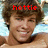 Static pixelated image of a person with brown hair and light skin, wearing no shirt, against a blurred background with blue and white tones.
