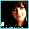 six shows a person with brown hair and bangs, wearing earrings and a light-colored top, with text reading "JUST SURRENDER..." at the bottom of each