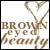Brown pixelated text reading "BROWN EYED BEAUTY" overlaid on a white background with brown X-shaped lines intersecting the text.