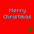 Red background with four blue "Merry Christmas" text blocks and two green/brown stars in a