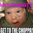 Pixelated image of a person with a green cap and green shirt, pink text above, white and black text below.
