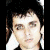 Four 50x50 pixel frames of a cartoon-style character with dark hair and black clothing, arranged in a 2x2 contact sheet showing subtle facial expression changes across the animation sequence.