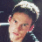 A pixelated image of a person with short dark hair wearing a white cap and striped shirt, next to green text reading 'OriginalIcons.com' on a dark background.