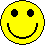 Two yellow pixelated smiley faces side-by-side on gray background; left face has solid black curved mouth, right face shows teeth with alternating white and dark pixels.