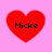 Four red heart shapes on a pink background, each containing the text 'Micke' in black pixelated font.