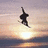 A pixelated image of a snowboarder mid-air against a sunset sky, with text reading "I Love Snowboarding" on the right.