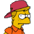 Pixelated cartoon character with yellow skin wearing a red backward cap and orange shirt against gray background.