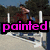 A pixelated image of a horse jumping over a white fence with trees in the background, overlaid with text in different colors.