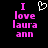 Pixelated text reads "I love laura ann" in pink with a white heart symbol above the word "love" on black background.