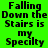 Pixelated text on a split background of green and yellow, with the phrase "Falling Down the Stairs is my Specilty" displayed in black block letters.