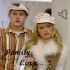 Two people stand side-by-side in a static image; the person on the left wears a striped shirt and cap, while the person on the right wears a white fur-like garment and cap, with text overlaid at the bottom.